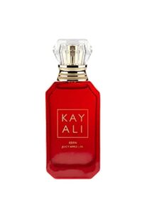Kayali Eden Juicy Apple 01 EDP 100ml elegant translucent ruby red glass bottle with a diamond-shaped cap for a premium sweet fruity unisex fragrance
