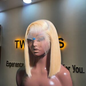 10-inch Super Double Drawn blonde Vietnamese bone straight human hair bob wig with a seamless 13x4 Swiss lace frontal on a mannequin.