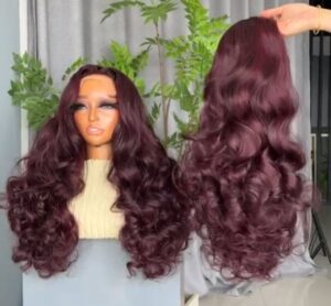 22-inch Super Double Drawn Burgundy Chinese Wavy human hair wig with a 13x4 Swiss lace frontal and voluminous layered curls.
