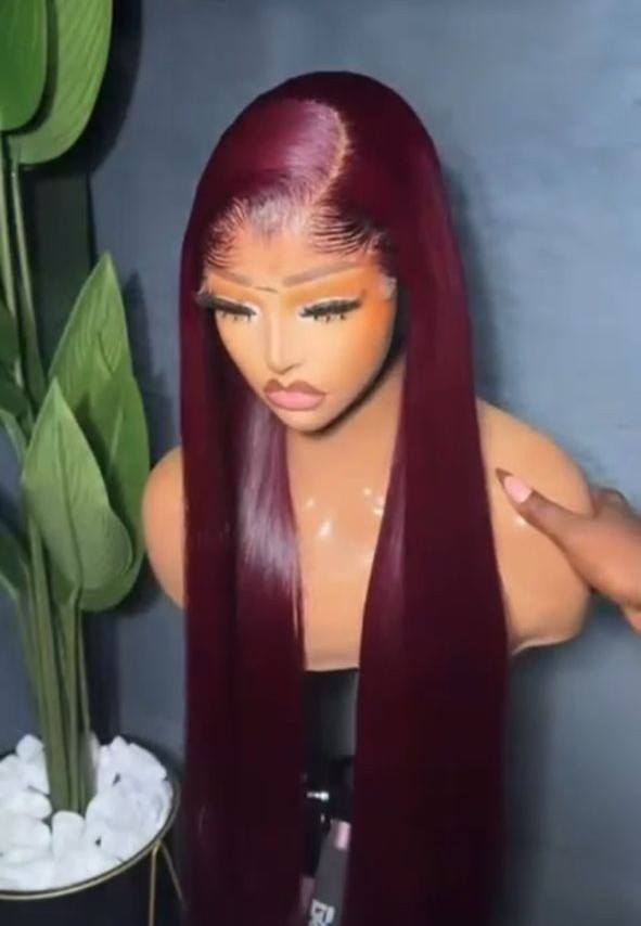 28-inch Super Double Drawn Burgundy Vietnamese Bone Straight human hair wig with a 5x5 Swiss lace closure.