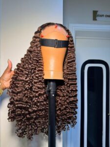 18-inch Chocolate Brown Burmese Curly human hair wig with a 5x5 Swiss lace closure and deep, defined spirals.