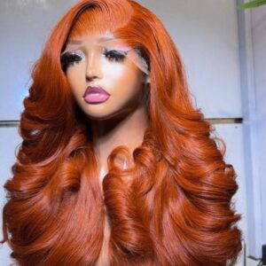 22-inch layered Cajun Ginger Vietnam Bounce Virgin human hair wig with a 5x5 lace closure styled in voluminous barrel curls.
