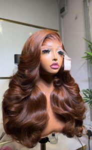 22-inch Chestnut Brown Vietnam Bounce Virgin hair wig with a 5x5 lace closure and elegant layered curls.