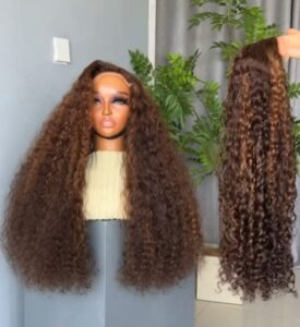22-inch Super Double Drawn Dark Piano Sassy Curls human hair wig with an HD lace closure and voluminous brown highlights.