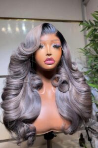 22-inch Super Double Drawn Ombre Grey Vietnam Bounce Virgin hair wig with a 5x5 Swiss lace closure and high-volume layered curls.