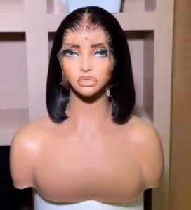 8-inch Super Double Drawn natural color Vietnamese bone straight human hair bob wig with a seamless 13x4 Swiss lace frontal on a mannequin.