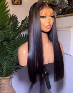 20-inch Super Double Drawn natural black Vietnamese bone straight human hair wig displaying a sleek, high-shine surface and a flat center-parted 5x5 lace closure.