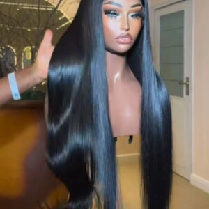 28-inch Super Double Drawn natural black Vietnamese bone straight human hair wig showing the flat 5x5 Swiss lace closure parting and an ultra-glossy finish.