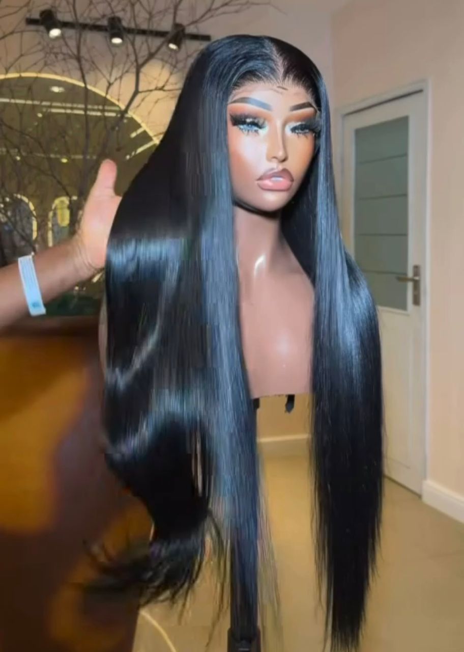 28-inch Super Double Drawn natural black Vietnamese bone straight human hair wig showing the flat 5x5 Swiss lace closure parting and an ultra-glossy finish.