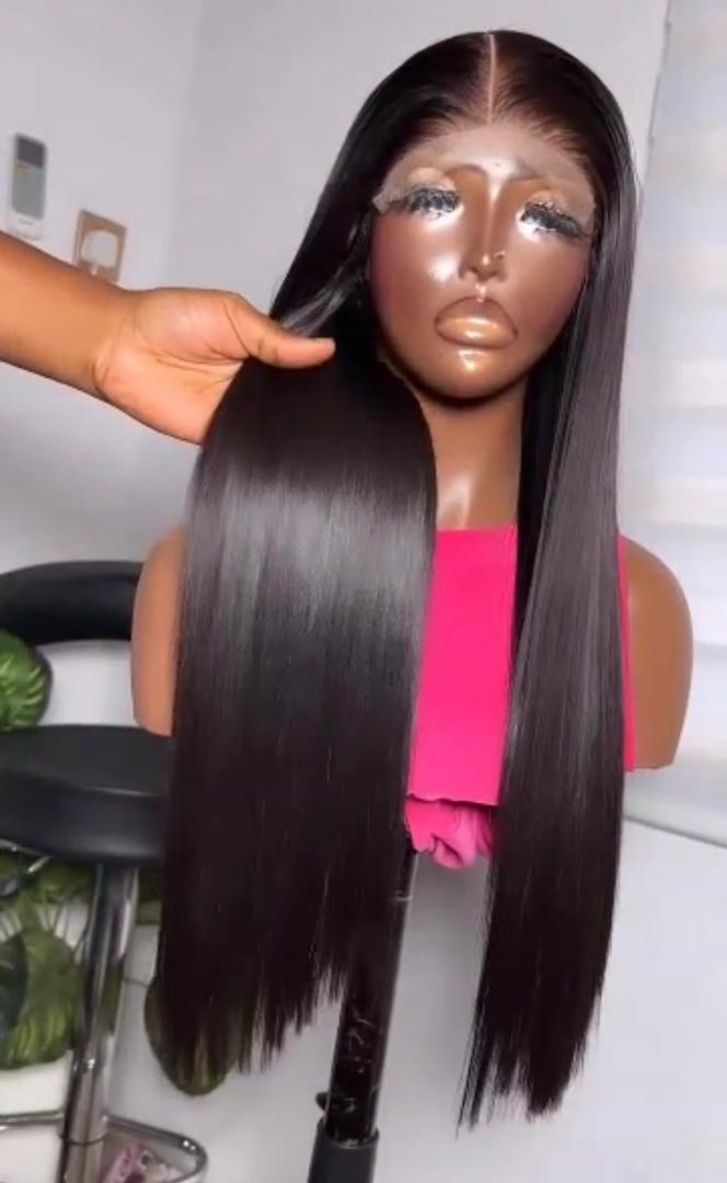 18-inch Super Double Drawn natural black Vietnamese bone straight human hair closure wig displaying an iron-flat structure and high-shine surface.