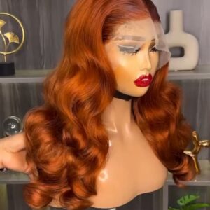 18-inch Super Double Drawn brilliant orange human hair wig with a 13x4 Swiss lace frontal and high-shine Hollywood waves.