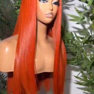 Long Super Double Drawn vibrant orange Vietnamese bone straight human hair wig displaying an iron-flat surface and a flat center parting from multiple showroom angles.