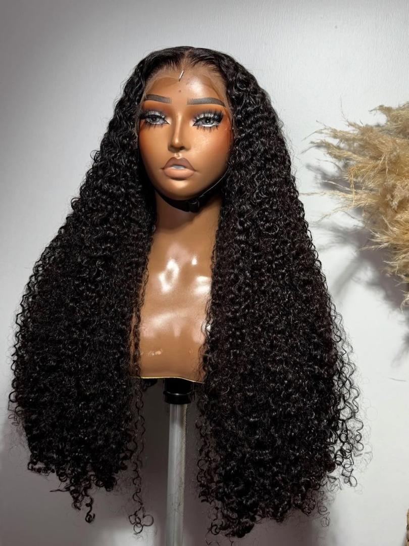 28-inch Super Double Drawn Natural Black Raw Pixie Curls wig with a 13x6 lace frontal on a mannequin.