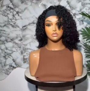 14-inch Super Double Drawn natural color pixie curly human hair headband wig displaying bouncy, high-density wet look ringlets on a black comfort band base.
