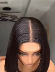8-inch super double drawn natural color Vietnamese bone straight human hair bob wig cut into a sharp, graduated asymmetrical A-line profile with a 2x6 closure.