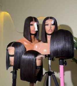 10-inch Super Double Drawn Natural Black Vietnam Bone Straight hair wigs with closure on a mannequin.