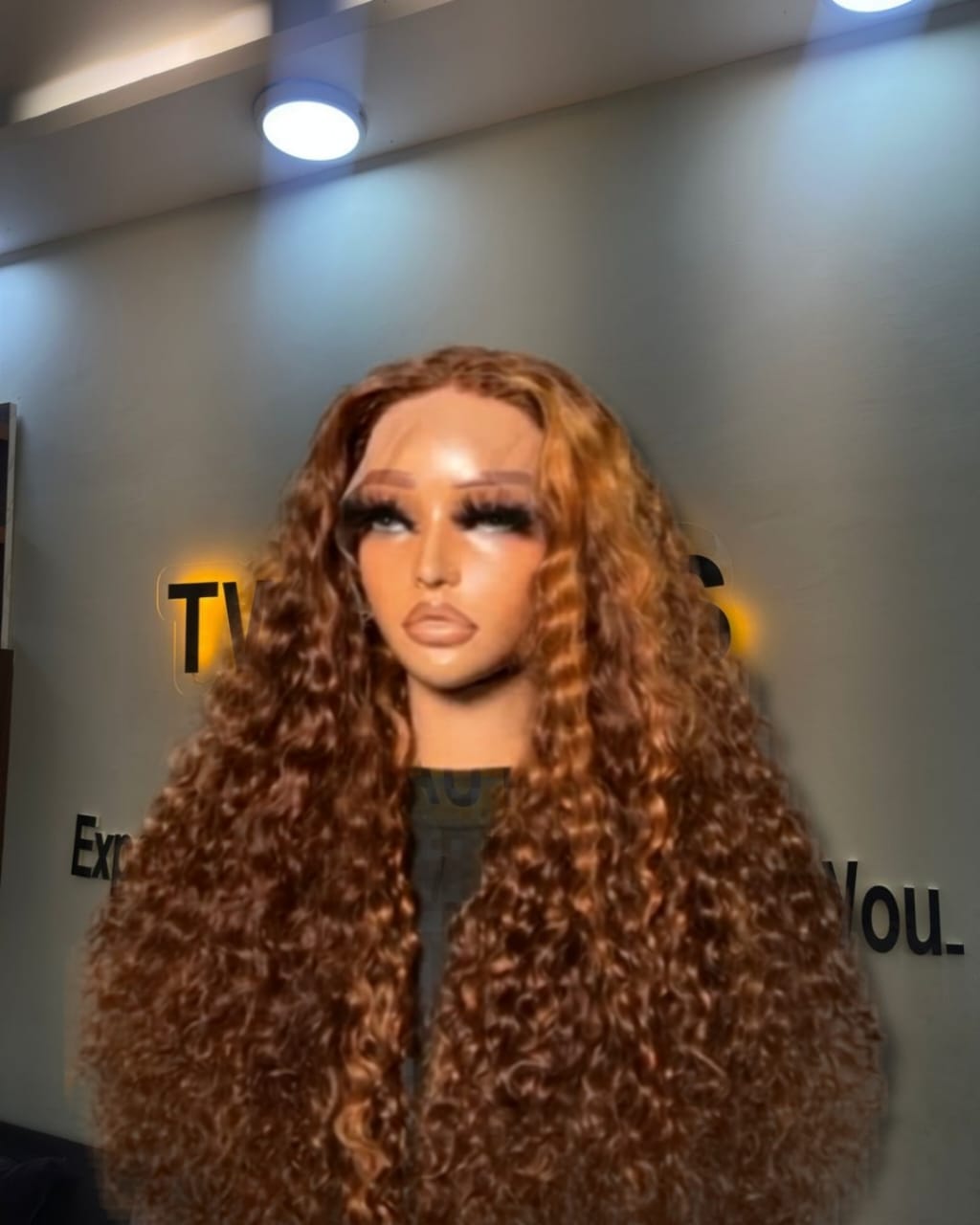 22-inch Super Double Drawn Piano Highlight Chinese Pixie Curls human hair wig with a 5x5 Swiss lace closure and high-volume curls.