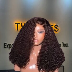 14-inch to 18-inch premium raw deep curly human hair wig dyed a rich chestnut chocolate brown color, styled with defined, high-volume corkscrew ringlets.
