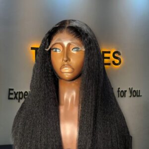 20-inch premium kinky straight human hair closure wig displaying an ultra-full textured blow-out look styled cleanly with a 5x5 Swiss lace center part.