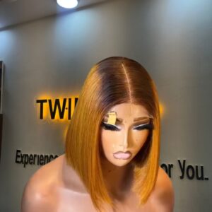 10-inch Super Double Drawn Yellowish Blonde Vietnamese Bone Straight human hair bob wig with a dark root and a 2x6 Swiss lace closure.
